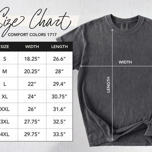 May include: A dark gray Comfort Colors 1717 t-shirt with a size chart. The chart lists sizes S to 4XL, with corresponding width and length measurements in inches. The shirt's width and length are indicated with arrows.