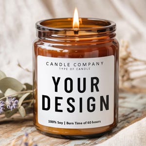 May include: A lit candle in a brown glass jar with a white label. The label reads "CANDLE COMPANY, TYPE OF CANDLE, YOUR DESIGN, 100% Soy | Burn Time of 40 hours". The candle is on a wooden surface.