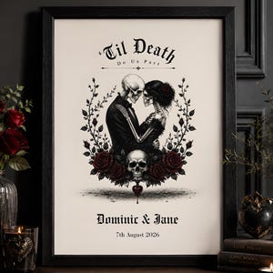 May include: A framed print featuring a black and white illustration of two skeletons embracing, surrounded by red roses and vines. The text reads 'Til Death Do Us Part', 'Dominic & Jane', and '7th August 2026'. A skull is positioned below the skeletons.