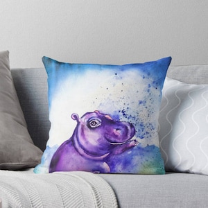 May include: A watercolor painting of a purple hippopotamus with a blue and white background. The hippopotamus is looking up and has a happy expression.