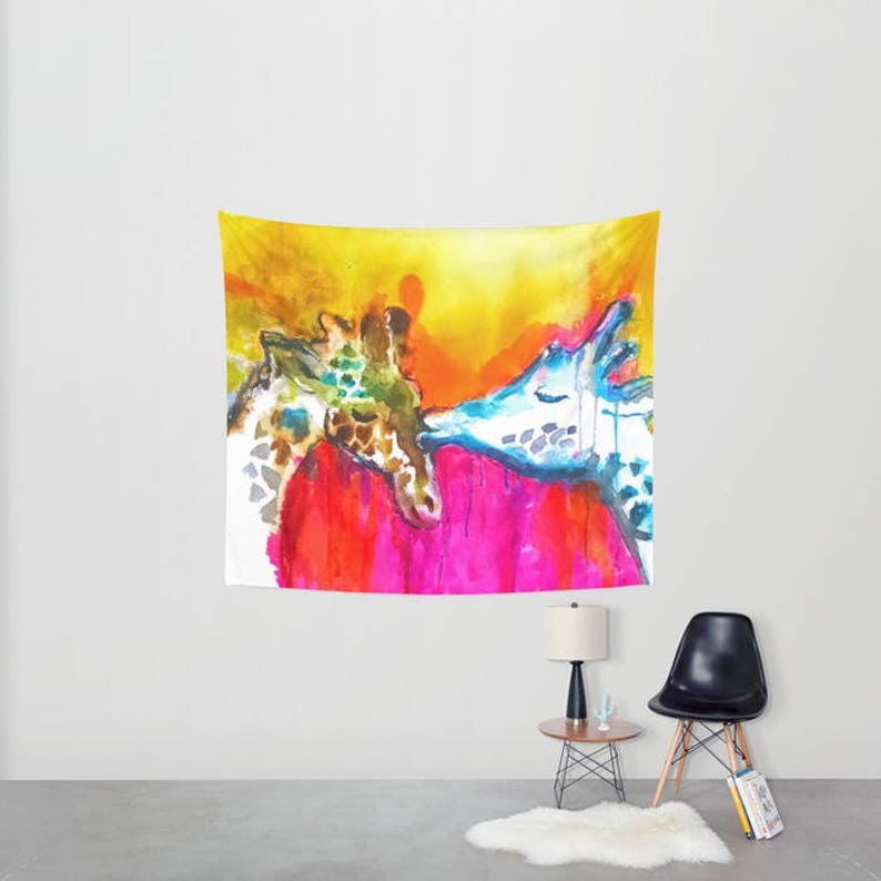 May include: A watercolor painting of two giraffes kissing. The giraffes are painted in shades of blue, green, and brown, and the background is a vibrant yellow and pink.
