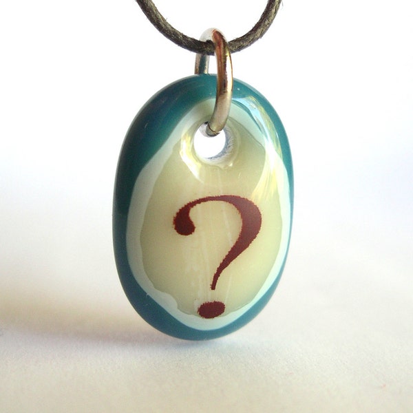 Question. A fused glass pendant necklace. Wearable art, punctuation, text, words, message.