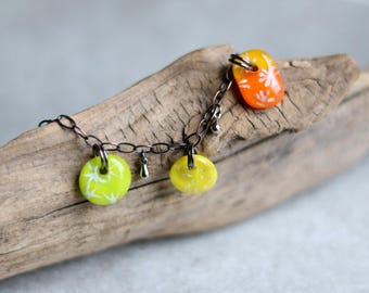 Citrus Glass Charm Bracelet – Fused Lime Orange Yellow Glass Jewelry with Silver Star and Flower Designs, Handmade Artisan Bracelet