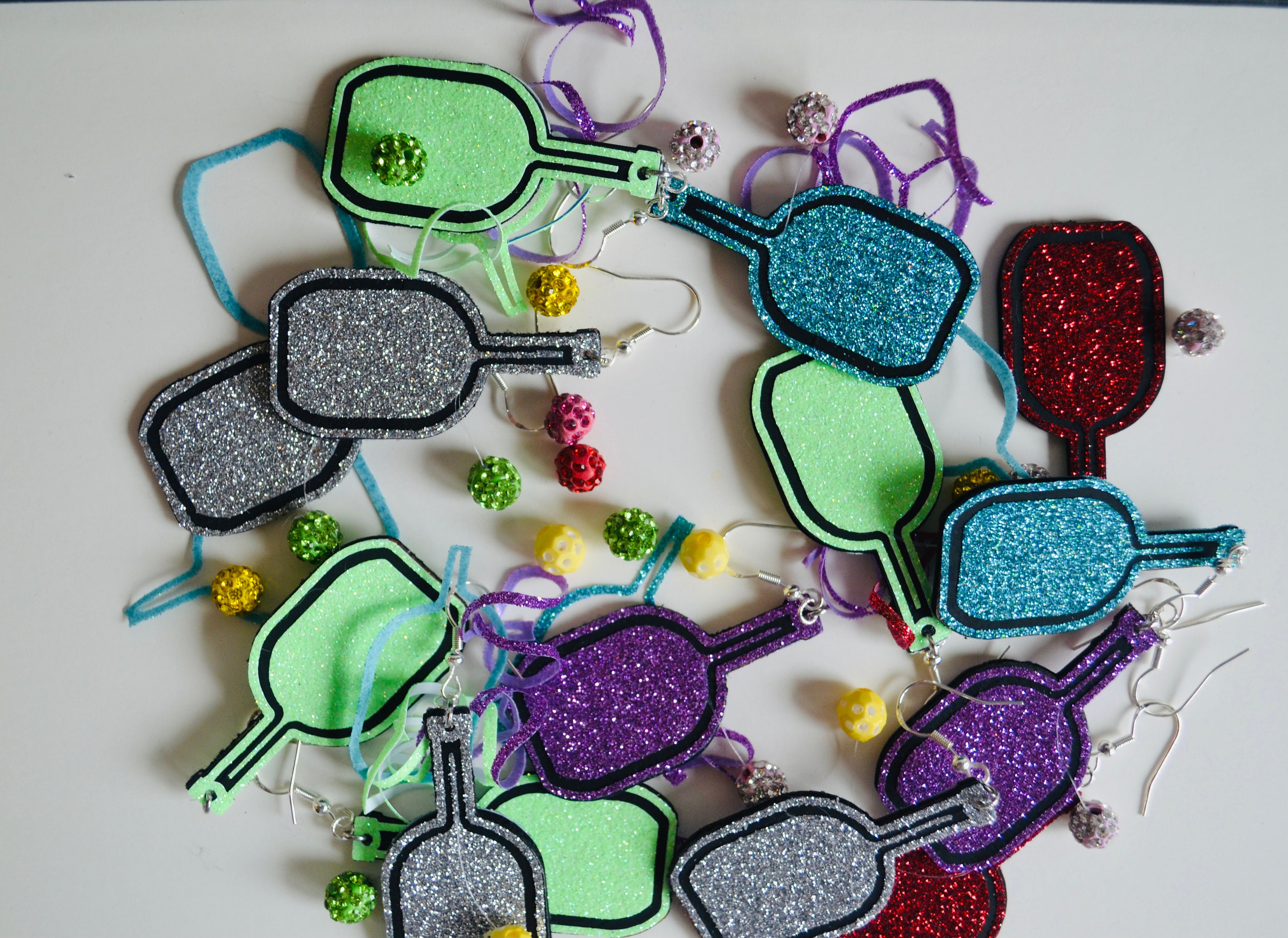 Fun action Pickleball Earrings with dangling moving pickleball bead for the Pickleball enthusiast or Pickleball player in your life.