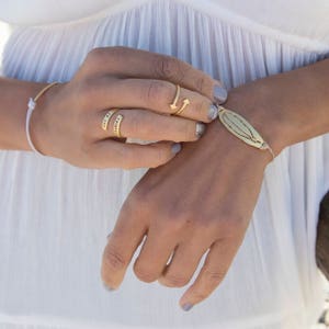 Ring "it's Never Too Late to Be What You Might Have Been" by George