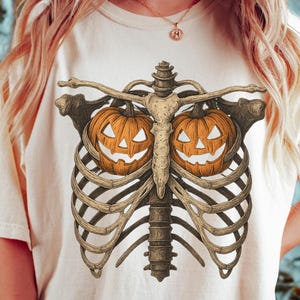 Comfort Colors® Skeleton Ribcage Pumpkin Shirt, Funny Spooky Bones Halloween Tee, Creepy Skeleton Chest Pumpkin Fall Graphic Shirt, Boho