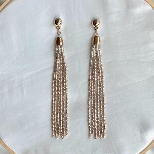 Handmade Rose Gold Seed Bead Tassel Earrings: Statement Dusters