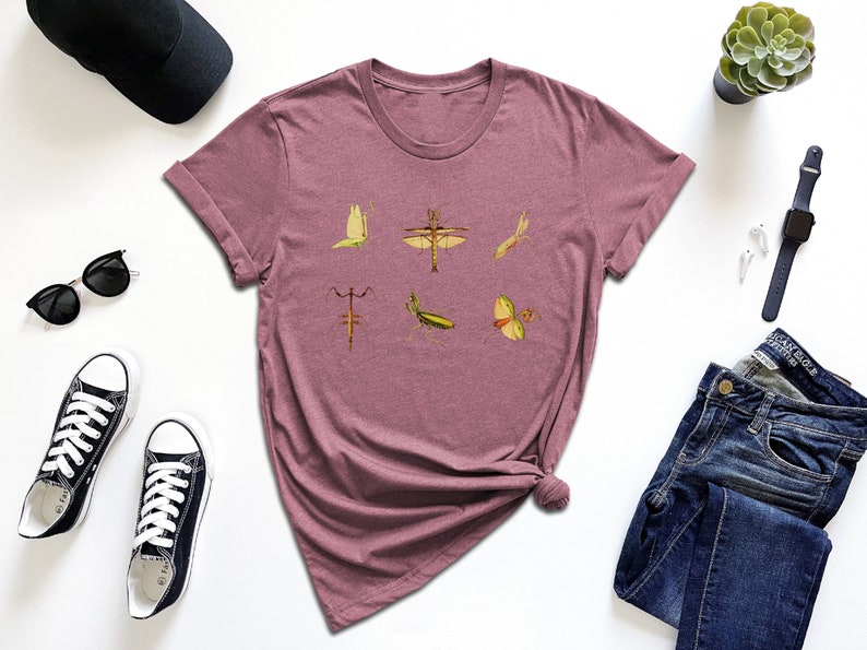 a t - shirt with a picture of birds on it