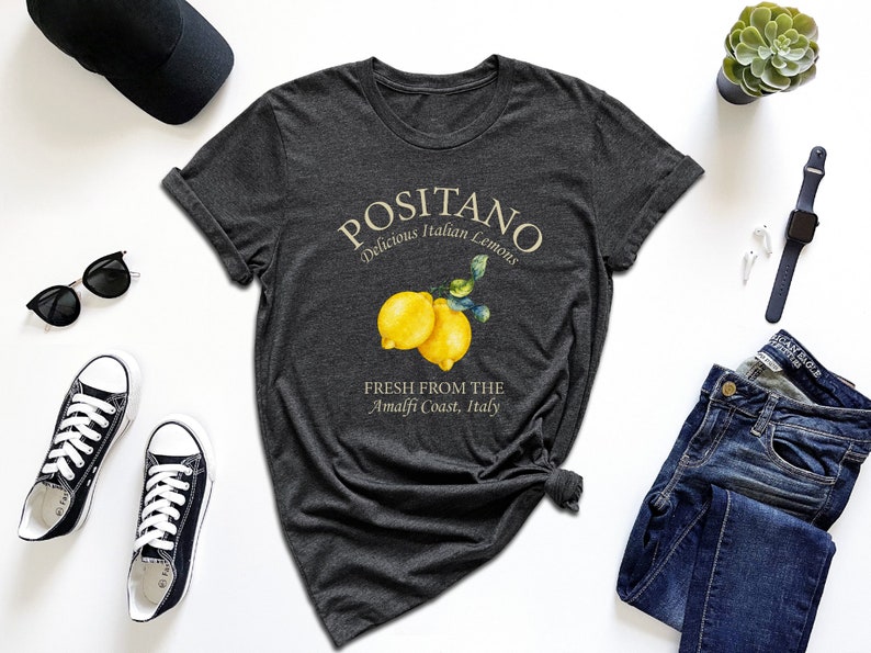 a t - shirt with a picture of two lemons on it