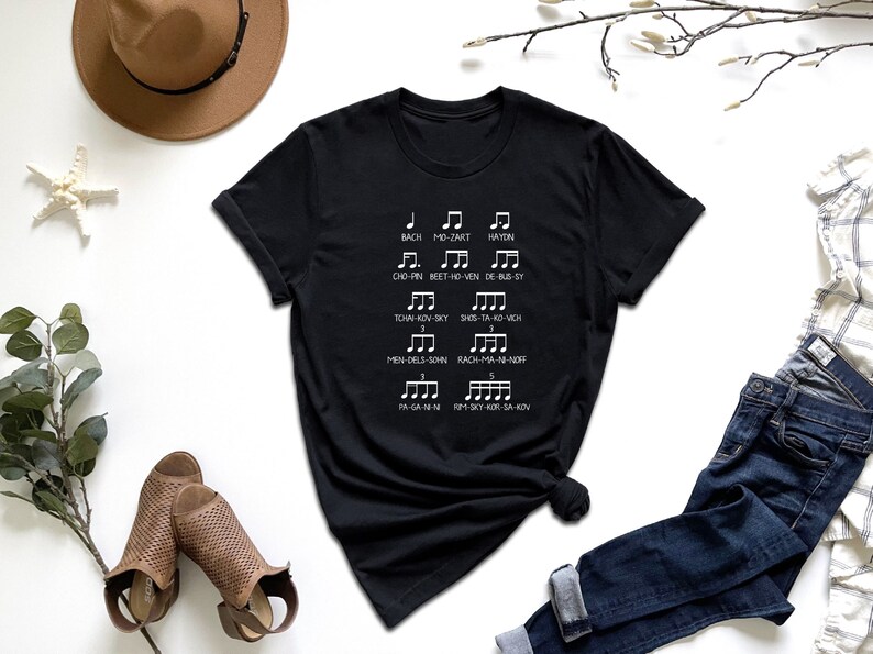 a t - shirt that has musical notes on it