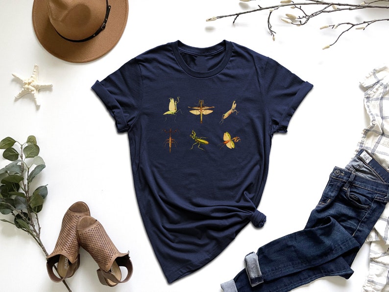 a t - shirt with a picture of birds on it