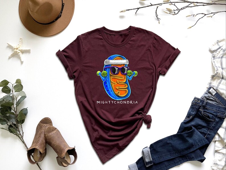 a t - shirt with a picture of a man wearing sunglasses