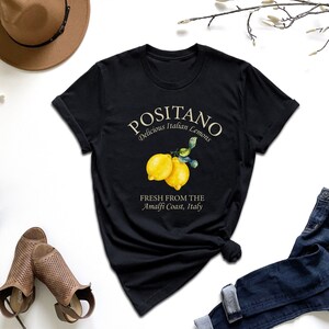 a t - shirt with a picture of a lemon on it