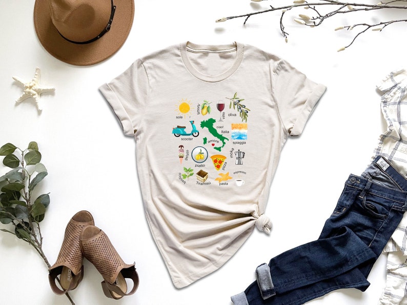 a t - shirt with a picture of a sea horse on it