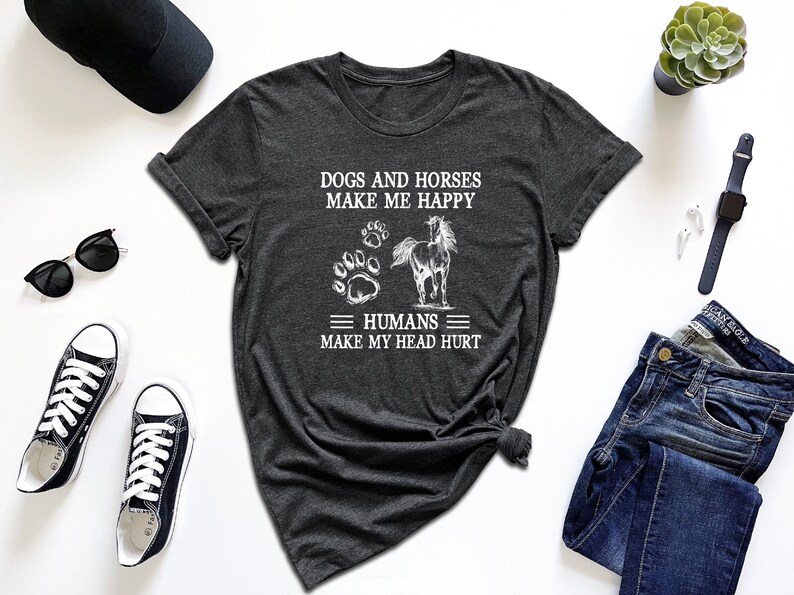 a t - shirt that says dogs and horses make me happy humans make my heart