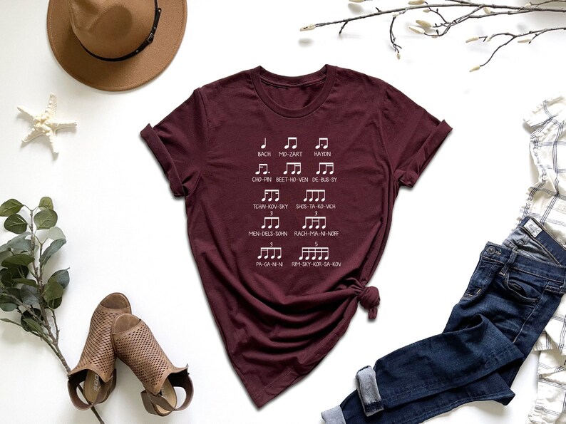 a t - shirt that has musical notes on it