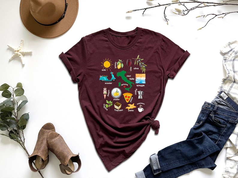 a women's t - shirt with a graphic of different things on it