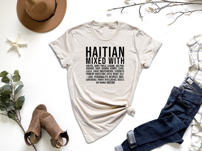 a t - shirt with the words, hat, jeans, and a pair of