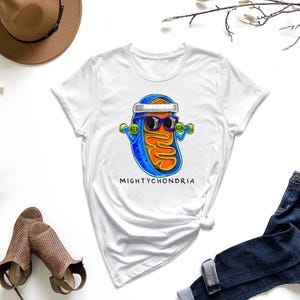 a t - shirt with a picture of a man wearing sunglasses