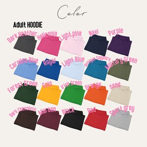 May include: A collection of adult hoodies in various colors, including dark heather, helliconia, light pink, navy, and purple. The image displays a range of hues, such as forest green, gold, and orange, with the word "Color" at the top.
