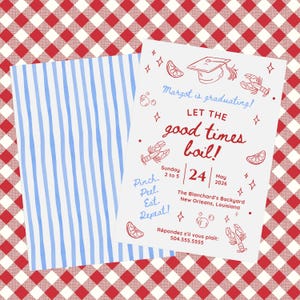 May include: A graduation party invitation with the text "Margot is graduating! Let the good times boil!" featuring lobster and lemon illustrations. The invitation is on a white background with a blue and white striped napkin and a red and white checkered tablecloth.