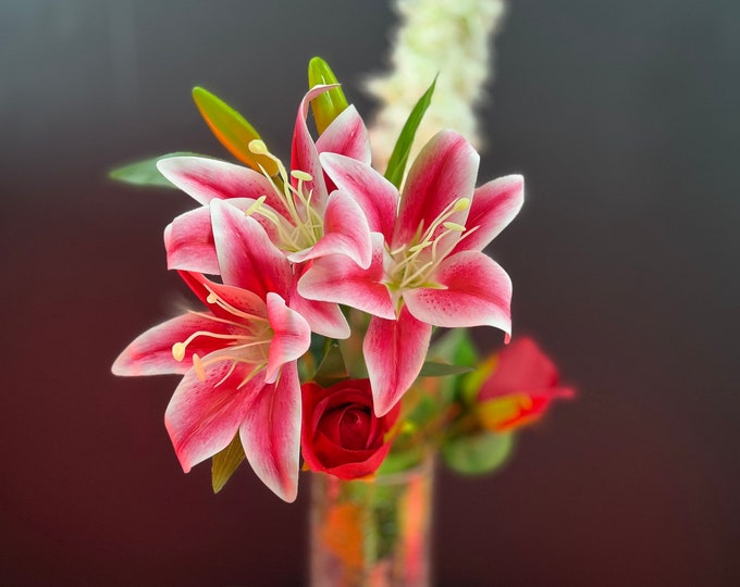 Scarlet Symphony, delphinium, lilies, and roses in a beautiful artificial flower arrangement
