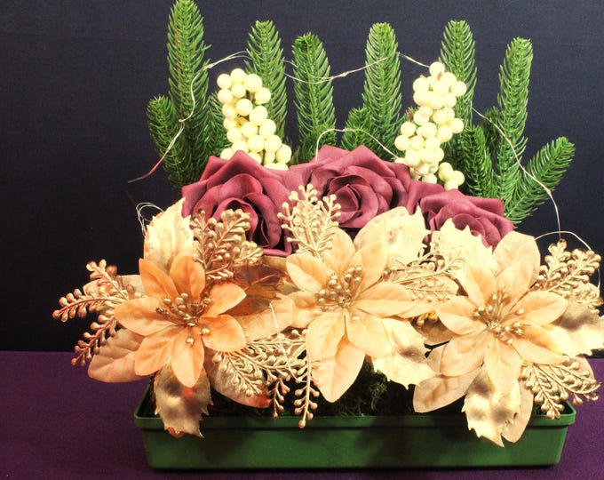 Poinsettia, Holly, Pine Tree, Burgundy & Beige Roses, Mini Hydrangea with LED Lights  Luxurious Centerpiece