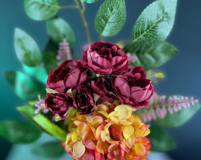 Warm Glow, Pink & Yellow Hydrangea, and Beautiful Burgundy Peonies in a square glass vase, artificial flower arrangement