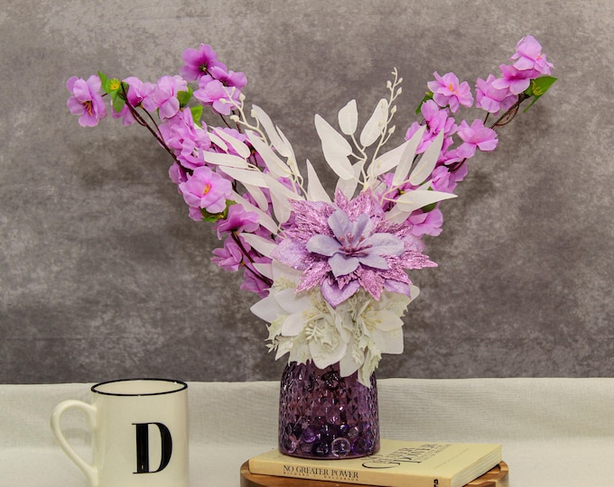 Purple & White Poinsettia Christmas Centerpiece – Sparkle Poinsettias, White Eucalyptus, LED Lights in Textured Glass Vase