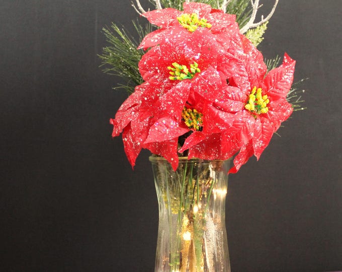 Snowy Poinsettia Holiday Centerpiece with Silver Antlers & Pine Branches – LED Lights in Crystal Vase