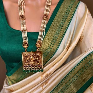 Ivory White Soft Art Silk Saree with Green Zari Weave Border