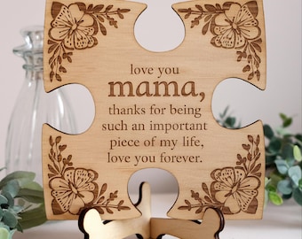 May include: Wooden puzzle piece shaped like a heart with a floral design and the text "love you mama, thanks for being such an important piece of my life, love you forever."