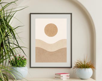May include: A framed abstract print with a minimalist landscape design. It features a sun and layered hills in beige and brown tones. The artwork is displayed on a wooden shelf, complemented by plants and books, creating a calm, natural aesthetic.