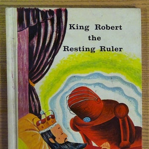 May include: A vintage children's book cover with an illustration of a king sleeping in a bed with a red robot standing over him. The title of the book is "King Robert the Resting Ruler".