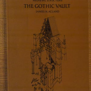 May include: A book titled "Medieval Structure: The Gothic Vault" by James H. Acland. The cover is a tan color with a detailed black and white architectural illustration of a Gothic vault.