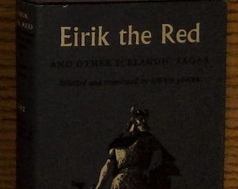 May include: A dark blue book with the title "Eirík the Red and Other Icelandic Sagas" in white text. The book cover features a black and white illustration of a Viking warrior holding a sword.