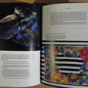 May include: A close-up of a blue and brown rock with a rough texture. The text "Observation is the key to understanding color" is visible in the bottom left corner of the image.