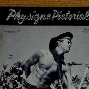 May include: Vintage magazine cover for Physique Pictorial, Volume 27, featuring a black and white image of a man in a cowboy hat. The magazine cover also includes the text "One Dollar".