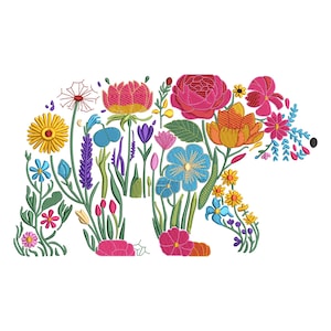 May include: A colorful floral bear design. The bear shape is filled with various flowers in shades of pink, yellow, blue, and orange, with green stems and leaves. The design is set against a white background.