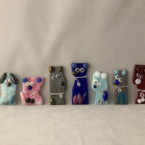 Fused glass animals with wire collars