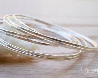 skinnies - hammered sterling silver bangles. stacking bangles. silver bracelets.