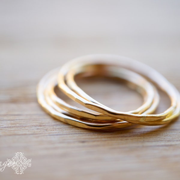 the gold STACK - hammered slim 14K gold-fill stacking ring. set of 3 gold bands.
