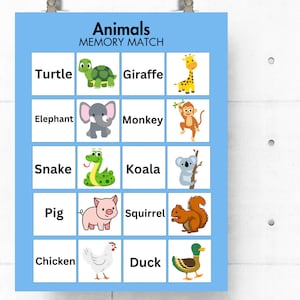May include: A blue and white memory match game with pictures of animals. The animals include a turtle, giraffe, elephant, monkey, snake, koala, pig, squirrel, chicken, and duck.