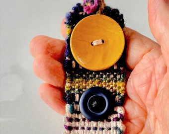 Hand Woven Fiesta Loom Bracelet with Yellow Gold Wooden Button, Hand Dyed Silk Yarns, Cotton Braided Yarn, Wool Yarns