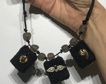 Hand Woven Pendant Trio in Black Linen/Cotton, Glass Beads, and Bali Silver Milagros Charms