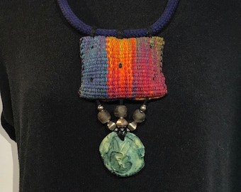 Hand Woven Hand Dyed Colorful Necklace with Clay and Beaded Peace Sign Drop in Rainbow Tones