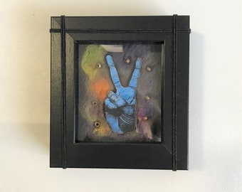 4" x 4" Framed Fiber Art with Blue Peace Sign Wood Cut with Hand Dyed Hand Spun Fibers and Gold Beads