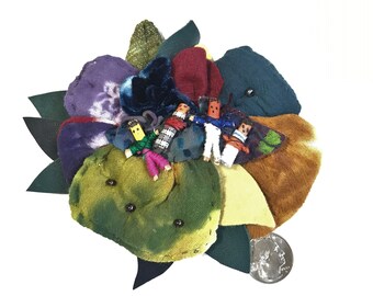 Brooch Pin Collage with Guatemalan Worry Dolls, Hand Dyed Navy Velvet, Gold Tussah Silk, Cotton Gauze, Wool Felt, Leather 5" x 5"