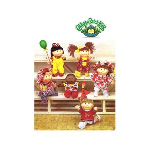 May include: A collection of Cabbage Patch Kids dolls, each with unique outfits and accessories. The dolls are arranged on a wooden shelf, showcasing various styles, including a doll holding a green balloon and another wearing a soccer uniform.