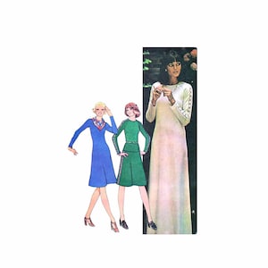 May include: Three women wearing different dresses. The woman on the left is wearing a blue dress with a white collar and a white scarf. The woman in the middle is wearing a green dress with a white belt. The woman on the right is wearing a white dress with long sleeves and a white collar.